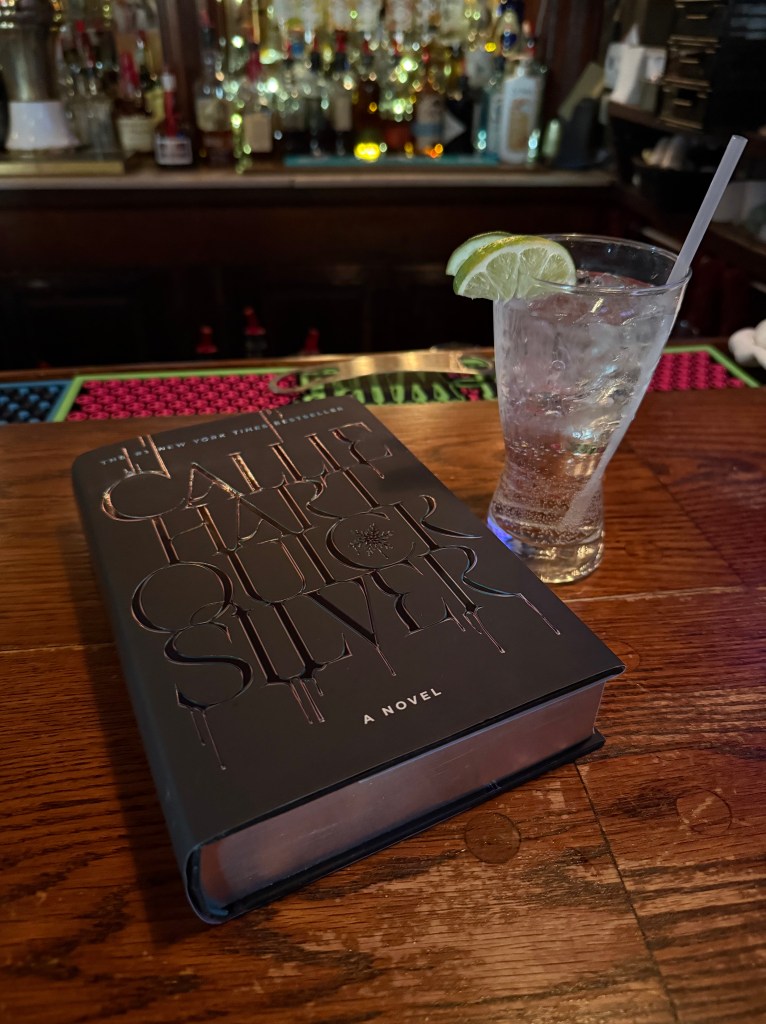 Vodka soda with lime and Quicksilver by Callie Hart